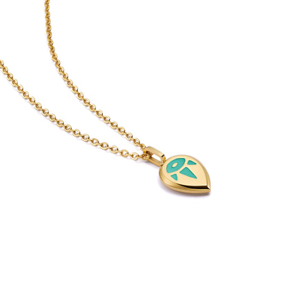 Gold SERENE necklace with a tear-drop shaped pendant with green embossing.
