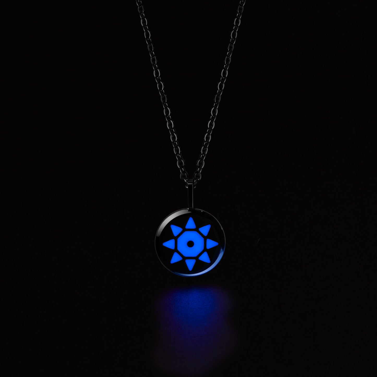 SOLIS Necklace with a blue glowing pendant on a black background