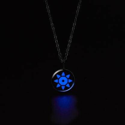 SOLIS Necklace with a blue glowing pendant on a black background