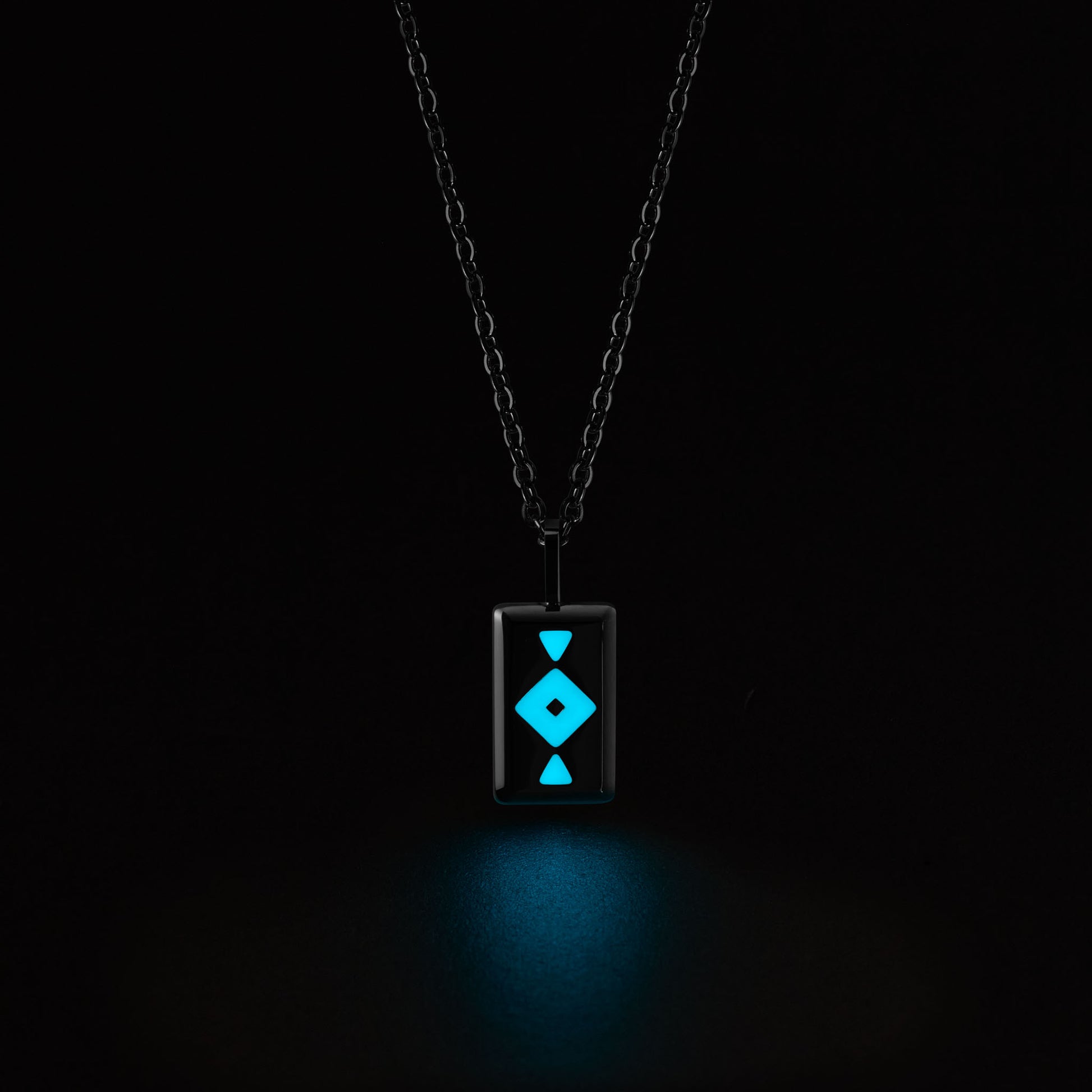 GAIA Necklace with a glowing blue pendant on a black background