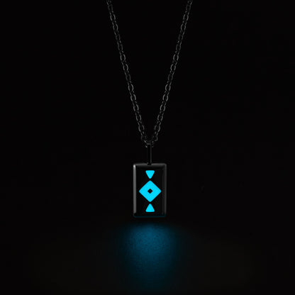 GAIA Necklace with a glowing blue pendant on a black background