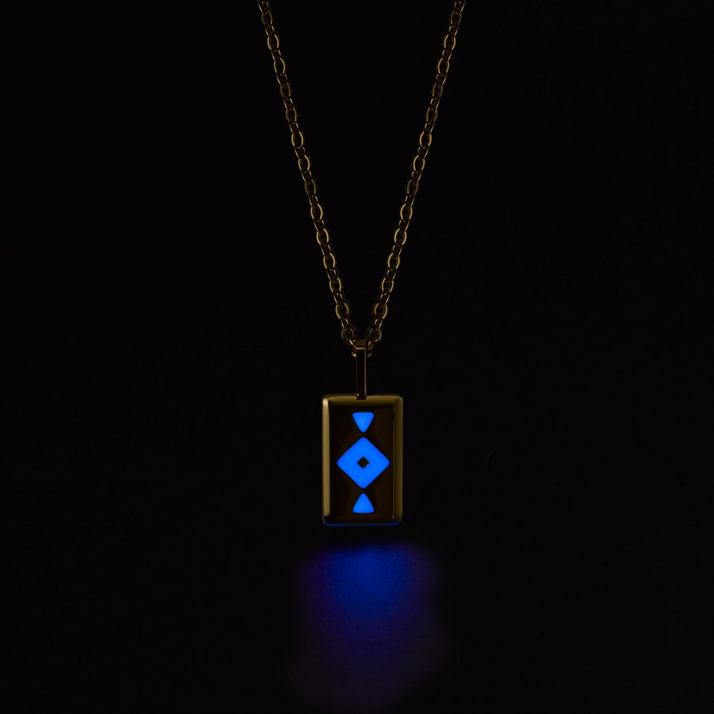 GAIA Necklace with a glowing blue pendant on a black background