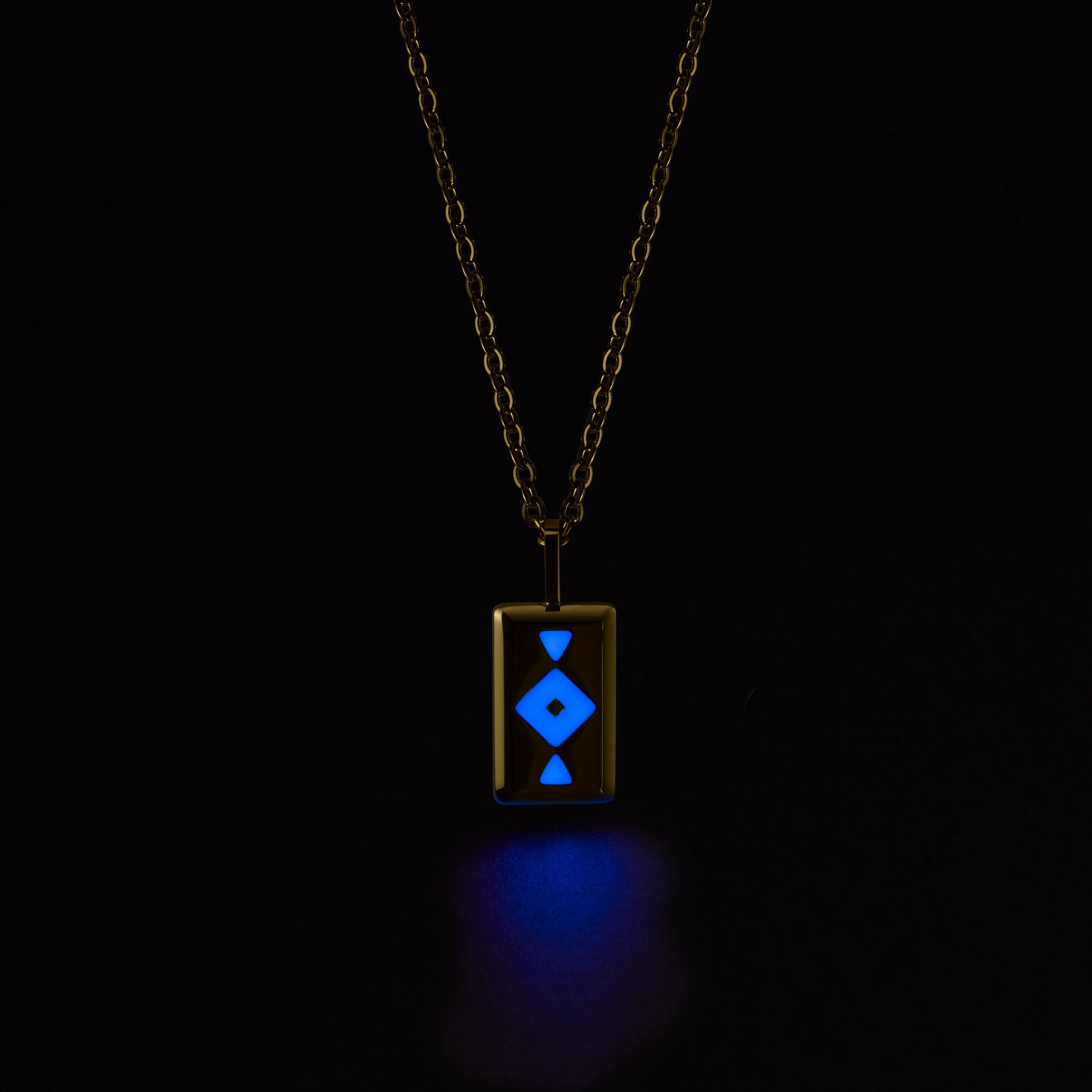 GAIA Necklace with a glowing blue pendant on a black background