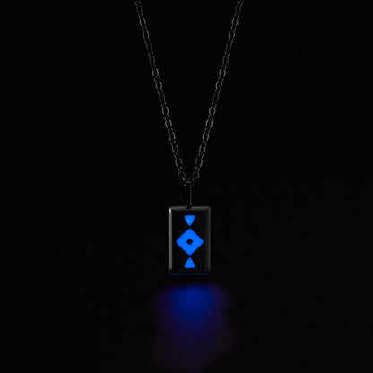 GAIA Necklace with a glowing blue pendant on a black background