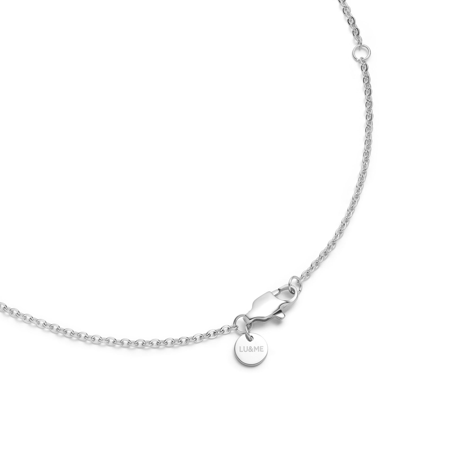 Silver necklace with a round pendant on the lobster claw clasp